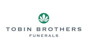 Modern Tobin Brothers Funerals logo in simple green and white design.