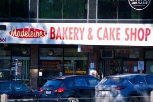 Bright bakery and cake shop storefront at Diamond Creek Shopping centre in Australia.