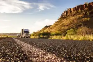 View of trucks on the road near Diamond Creek Shopping Centre in Australia.