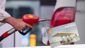 Shell Service Station fueling with Shell Card payment terminal.
