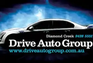 Black car with Drive Auto Group logo and contact details at Diamond Creek.