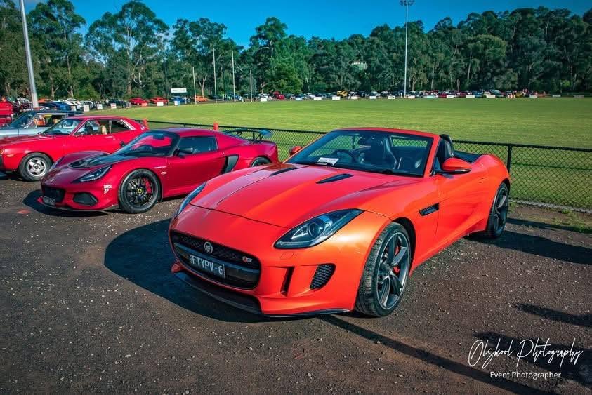 Red sports cars at Diamond Creek CarFest event in Australia.