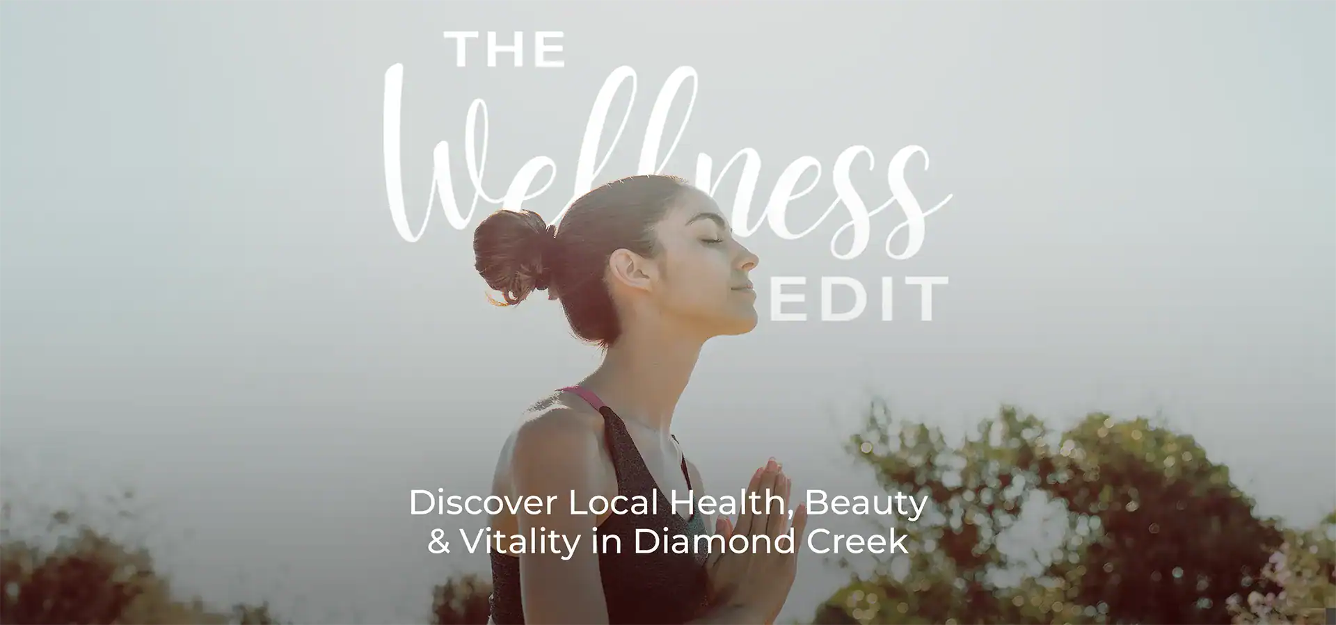 Woman practicing yoga outdoors at Diamond Creek Shopping for wellness and vitality.