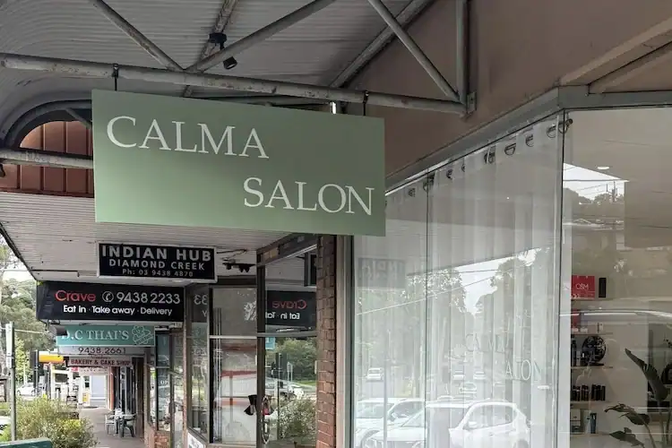 Calma Salon sign outside Diamond Creek Shopping centre in Australia.