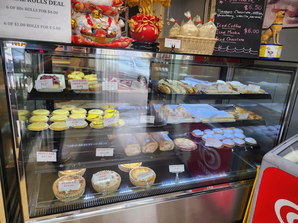 Christmas cakes on the counter at Madeleine's Bakery in Diamond Creek