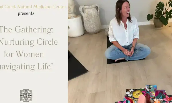 Women meditating in a circle during The Gathering event at Diamond Creek.